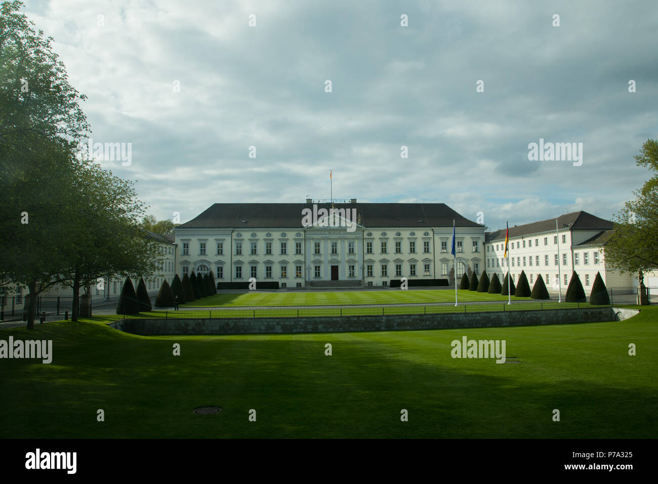 Schloss Bellevue, or Bellevue Palace, Berlin, the official residence of the German President under a cloudy sky in evening light Stock Photo