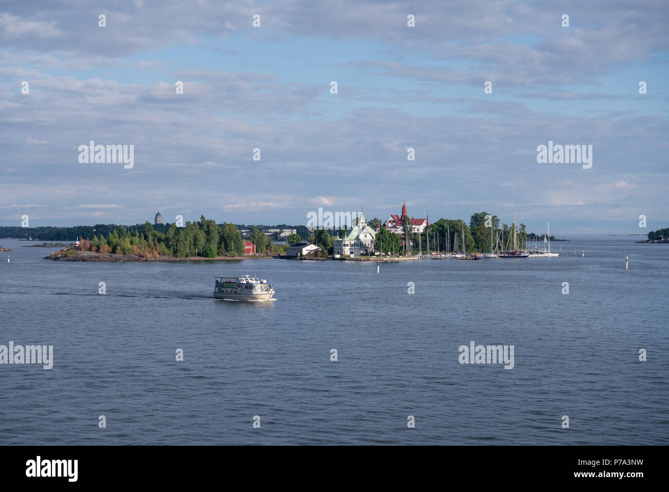 HELSINKI, FINLAND - 25/6/2018: Tourist boat arriving at Helsinki harbour with Valkosaari island in the background Stock Photo