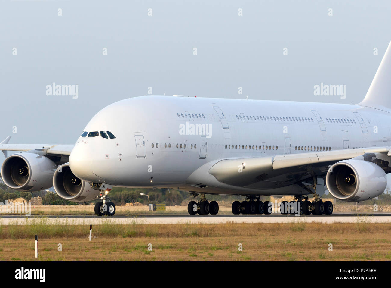 Hifly Malta Airbus A380-841 (9H-MIP) landing in Malta for painting into Hi Fly colors at Aviation Cosmetics Malta (ACM). Ex 9V-SKC with Singapore Airl Stock Photo