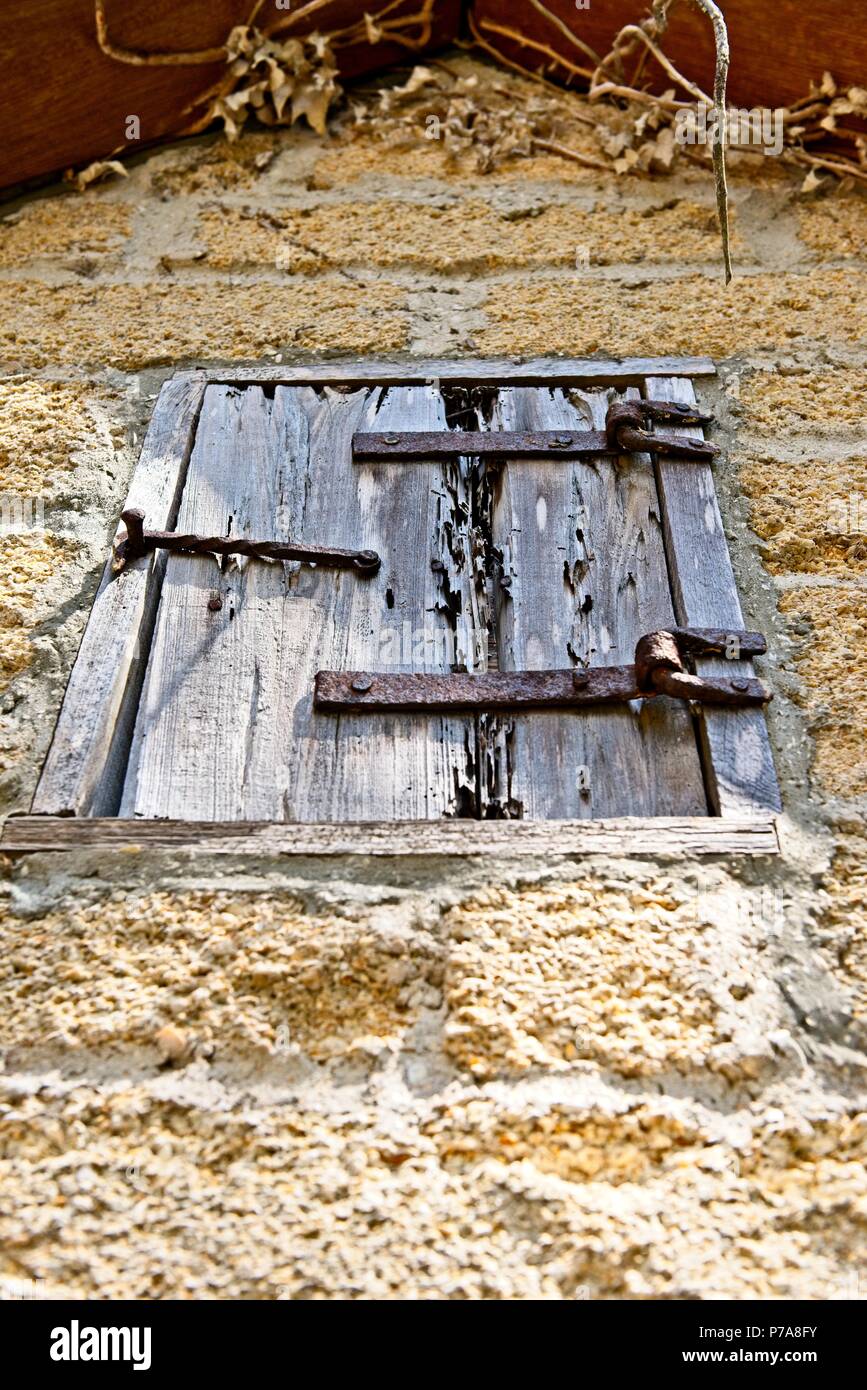 A view of an old wooden window cover at the Historic Gonzalez Alvarez House in St. Augustine, Florida USA Stock Photo