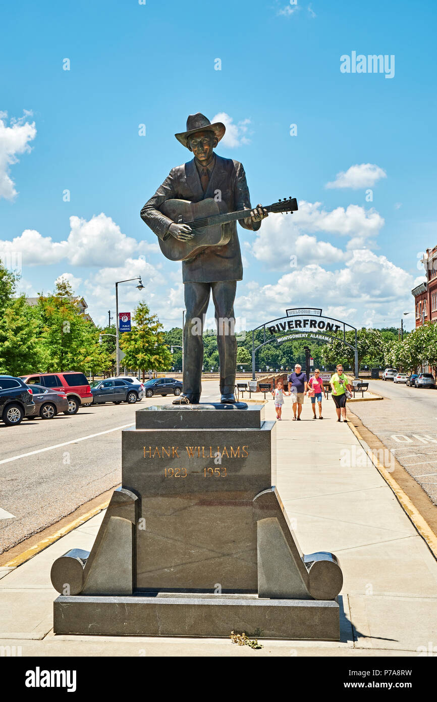 Memorial or commemorative statue of country western star Hank Williams Sr., a tourist attraction, in downtown Montgomery Alabama, USA. Stock Photo