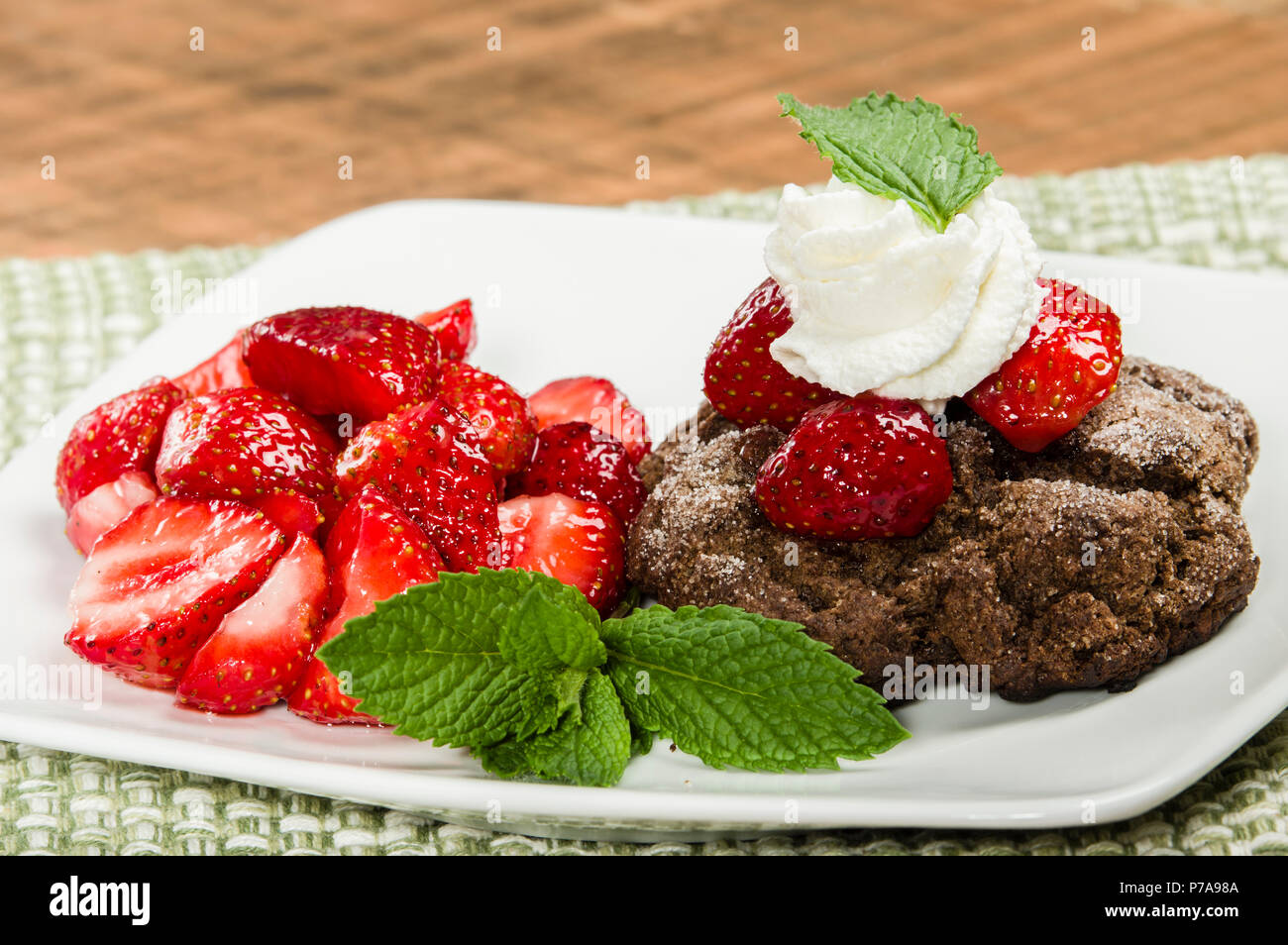 Fresh strawberry chocolate cookie dessert with whipped cream Stock Photo