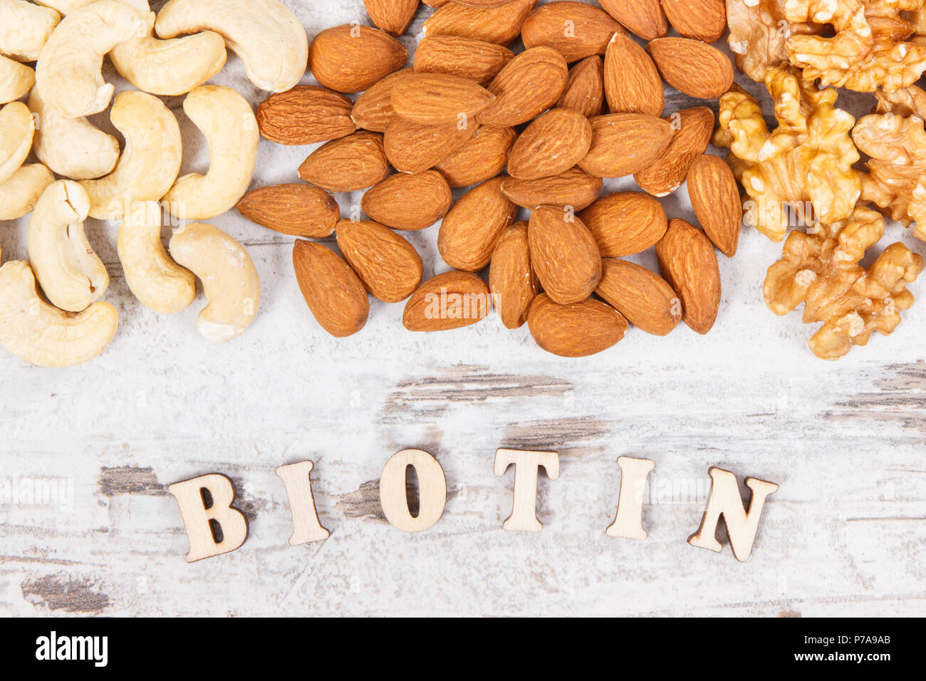 Inscription biotin with various dried fruits containing vitamin B7 and dietary fiber, natural