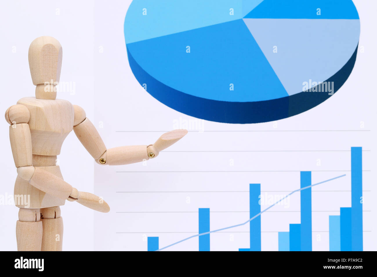 Wooden dummy with color chart printed documents Stock Photo