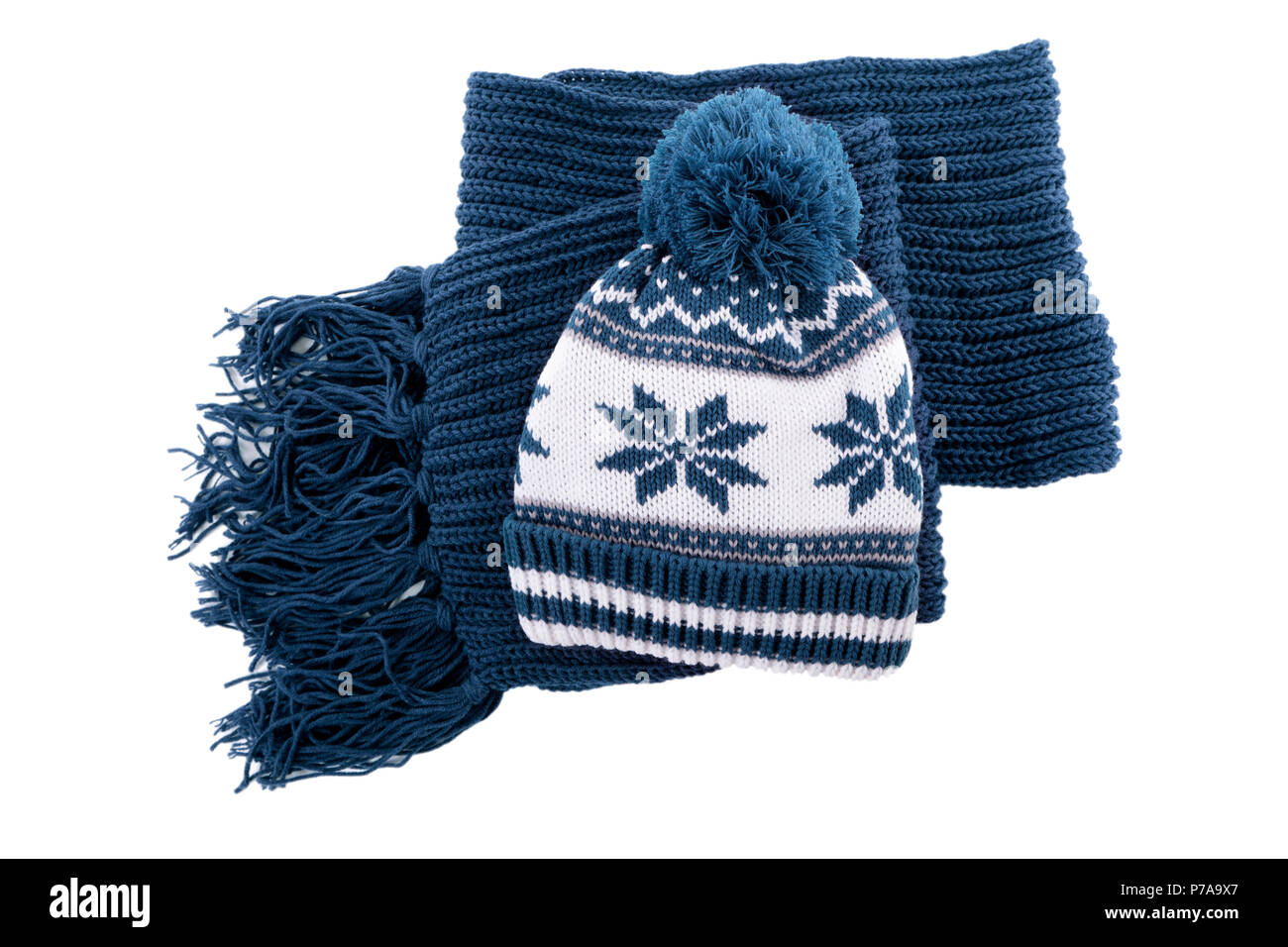 Blue Knitted Winter Bobble Hat And Scarf Isolated On A White