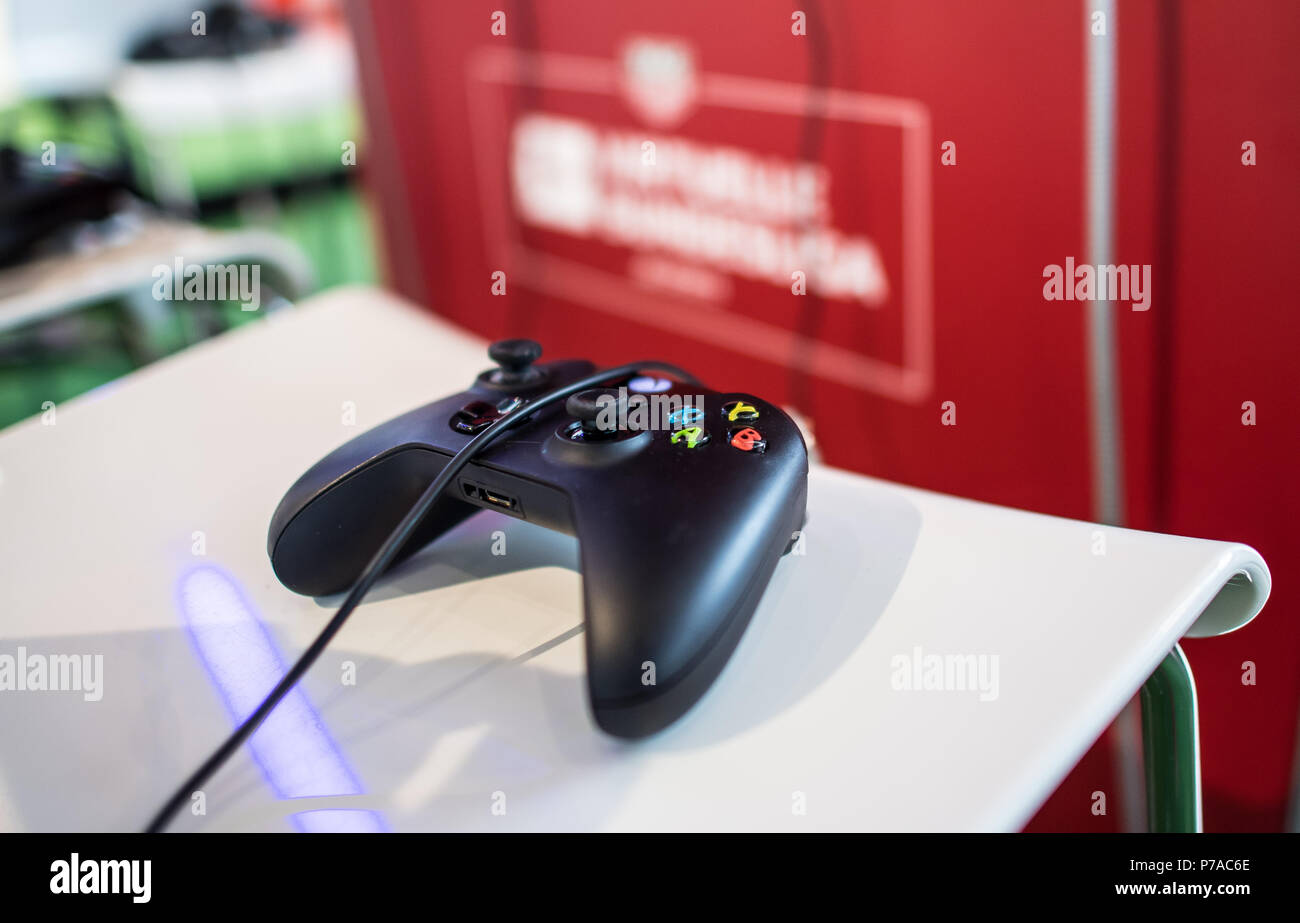 Germany, Dortmund. 31st Mar, 2018. Final of the 2017/2018 virtual  Bundesliga. A PS4 controller lying in front of the virtual Bundesliga logo.  The best 24 FIFA players in Germany are playing for
