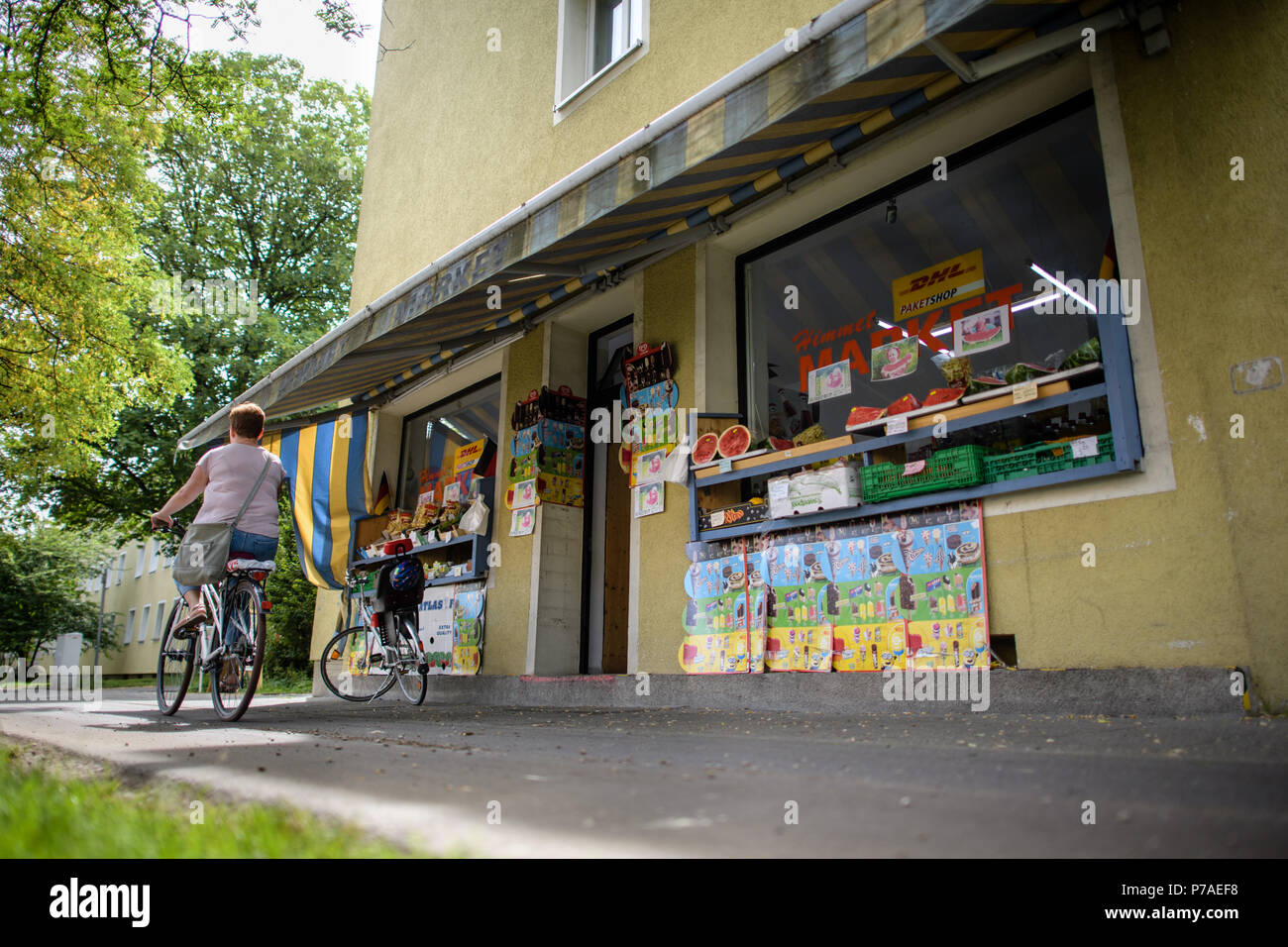 Germany, Munich. 5th July, 2018. the 'Himmet Market' at the Bad Schachener Street in the district of Ramersdorf. The rooms formerly housed the fish shop of Habil Kilic, 38 years old. He was murdered by the National Socialist Underground on the 29th of August 2001. The murder is commemorated by a memorial sign made of stone next to the shop. Credit: Matthias Balk/dpa/Alamy Live News Stock Photo