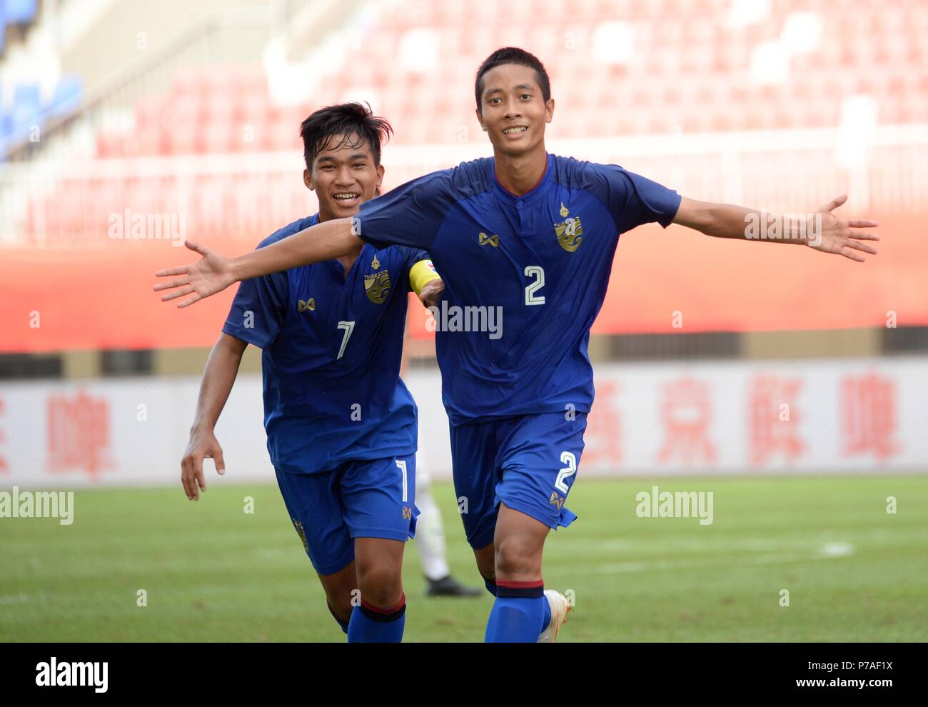 Weinan, China's Shaanxi Province. 5th July, 2018. Arthit Buangam (R) of  Thailand celebrates after scoring during the CFA International Youth  Football Tournament Weinan 2018 between Thailand U17 national team and  India U17