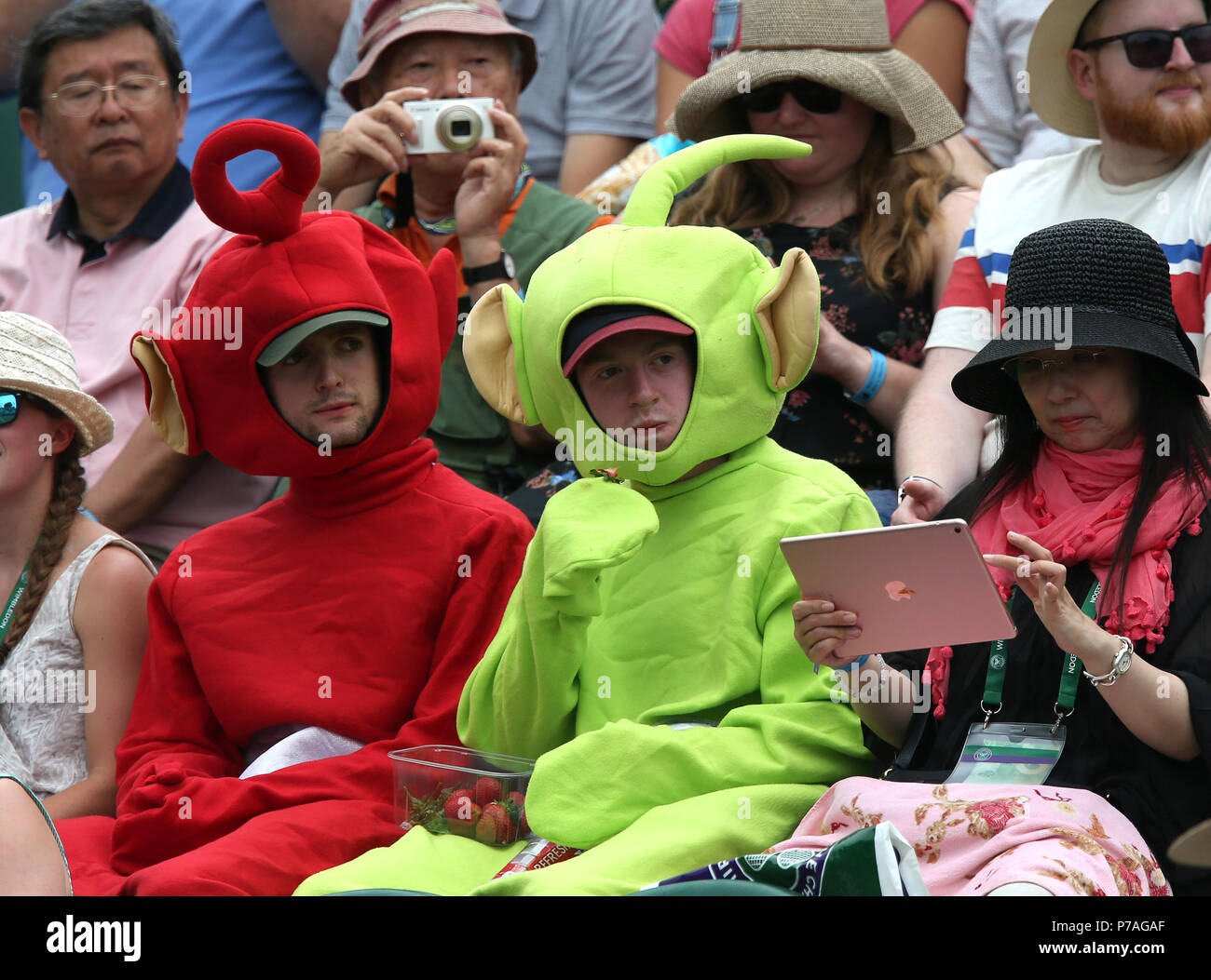 FANS DRESSED UP AS TELETUBBIES, THE WIMBLEDON CHAMPIONSHIPS 2018, THE WIMBLEDON CHAMPIONSHIPS 2018 THE ALL ENGLAND TENNIS CLUB, 2018 Stock Photo