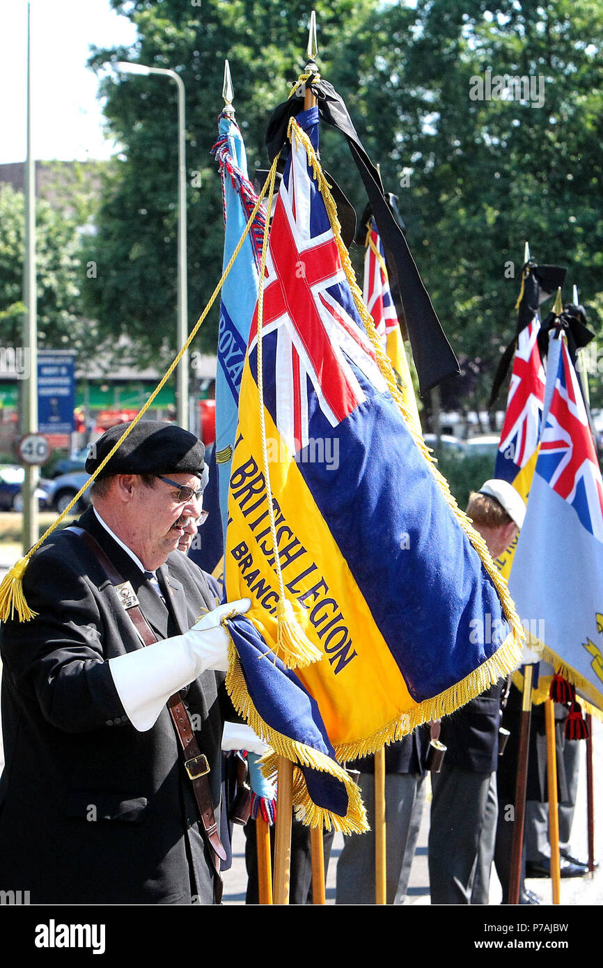 Carterton, UK. 5th July 2018. Royal British Legion standard bearers prepare for the arrival of the cortege at the repatriation of Pte Reece Miller of the 1st Battalion the Yorkshire Regiment who died in Estonia Picture: Ric Mellis 5/7/18 Carterton, Oxfordshire Credit: Ric Mellis/Alamy Live News Stock Photo