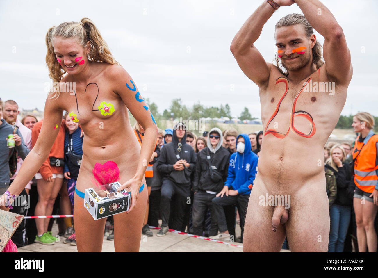 Naked runners Denmark, Roskilde - July 5, 2018. Naked runners have stripped off for  Roskilde festival annual Naked Race. One lucky man and woman claim the  prize, a ticket for next year's edition of