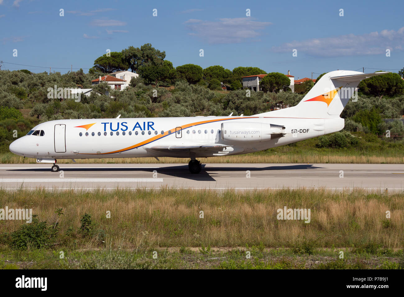 TUS Airline Fokker 70 carrying home Cyprian holiday makers from Skiathos Sporades, Greece. Stock Photo