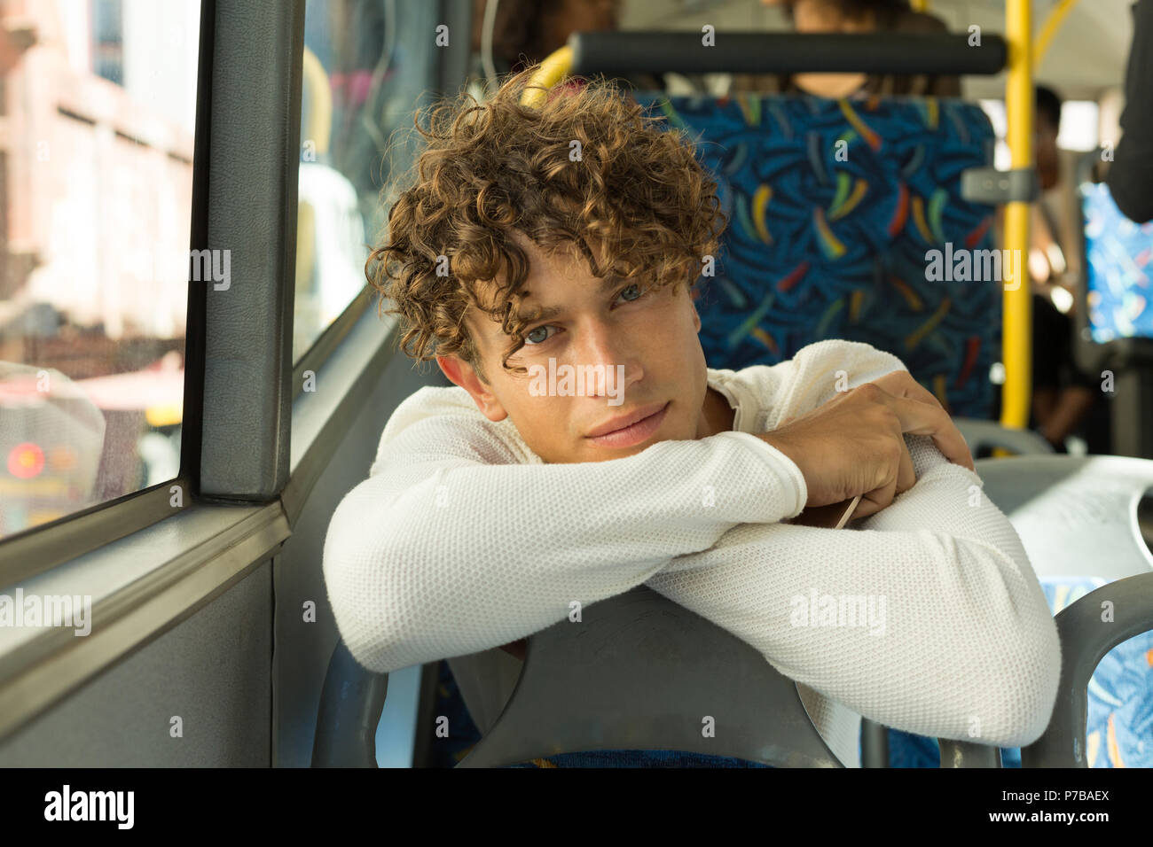 Young man travelling in the bus Stock Photo
