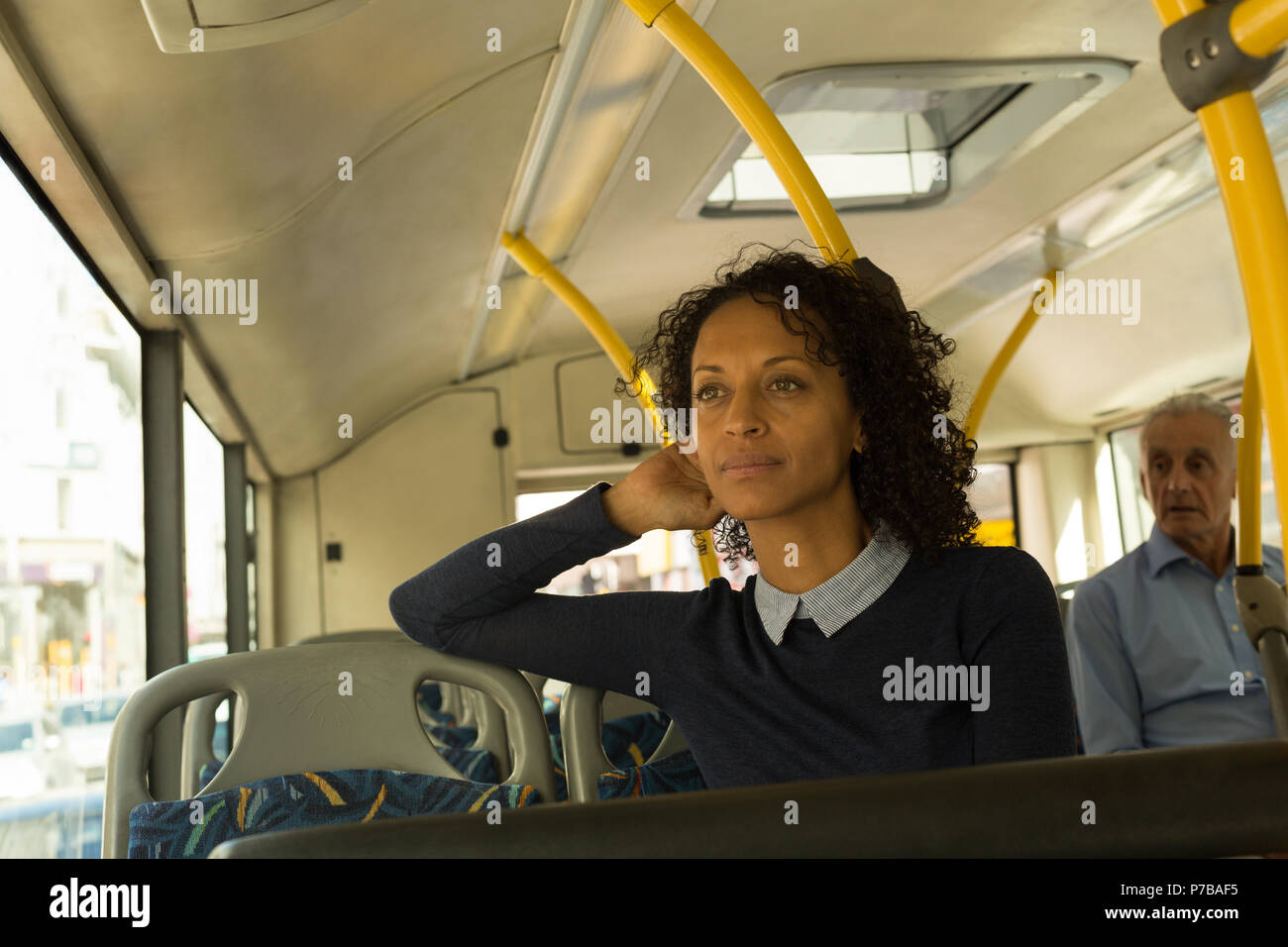 Woman travelling in the bus Stock Photo