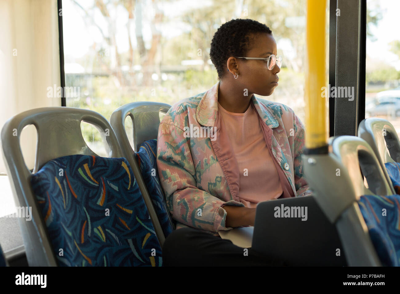 Woman travelling in the bus Stock Photo