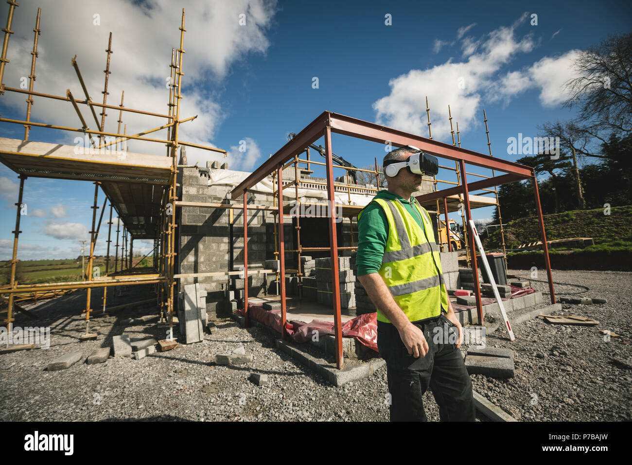 Engineer using VR headset at the construction site Stock Photo