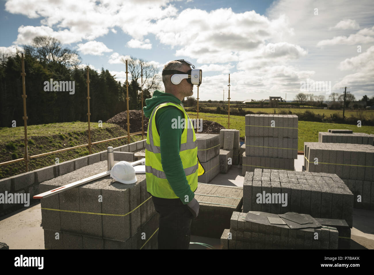 Engineer using VR headset at the construction site Stock Photo