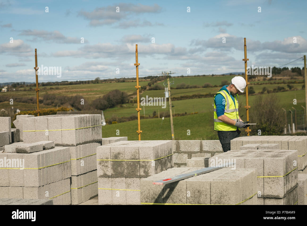 Engineer using digital tablet at the construction site Stock Photo