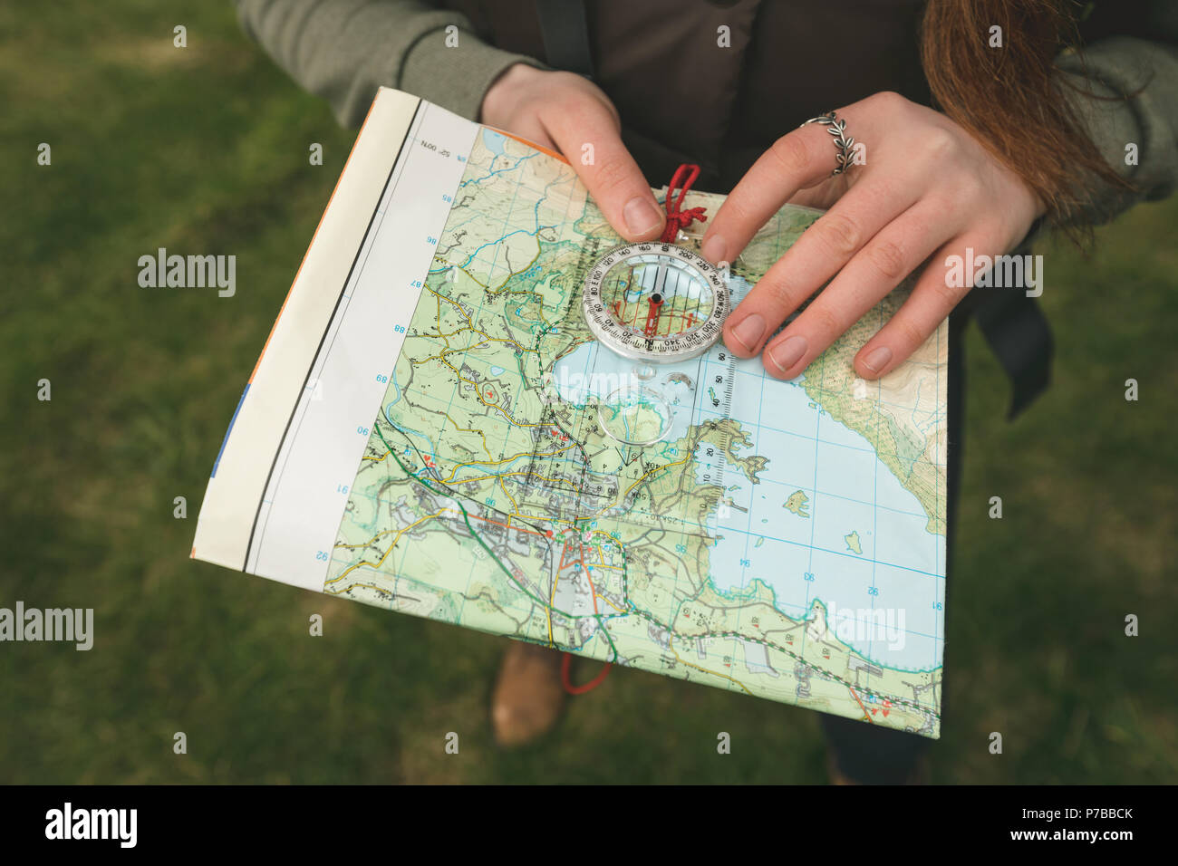 Female hiker reading a map Stock Photo