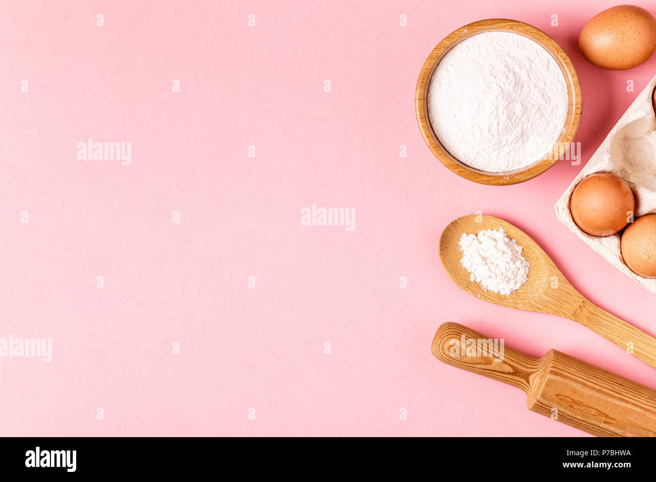 Ingredients and utensils for baking on a pastel background, top view