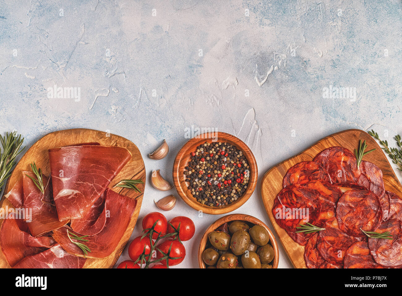 Spanish tapas with  chorizo,  jamon, picnic table, top view. Stock Photo