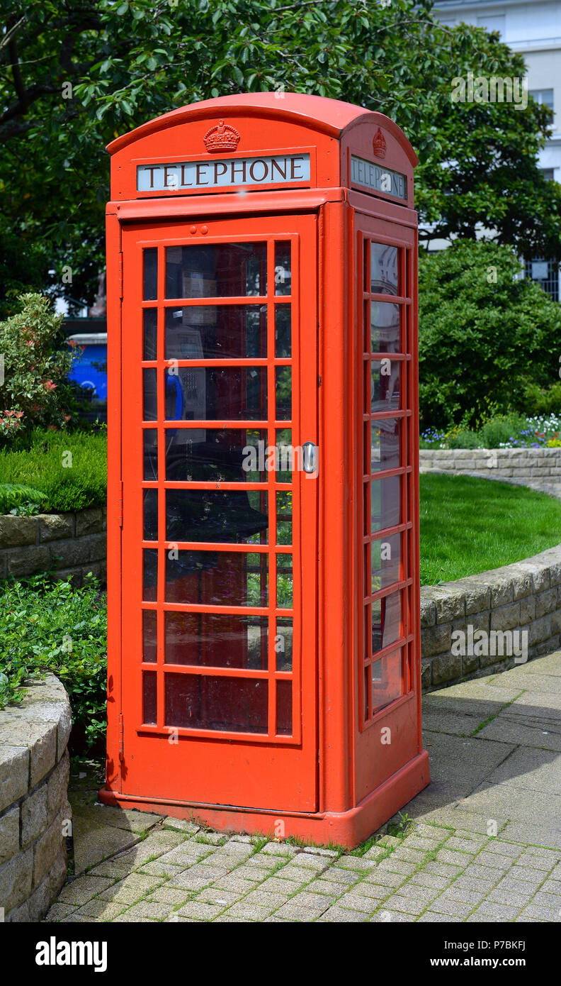 red phone booth on street Stock Photo Alamy