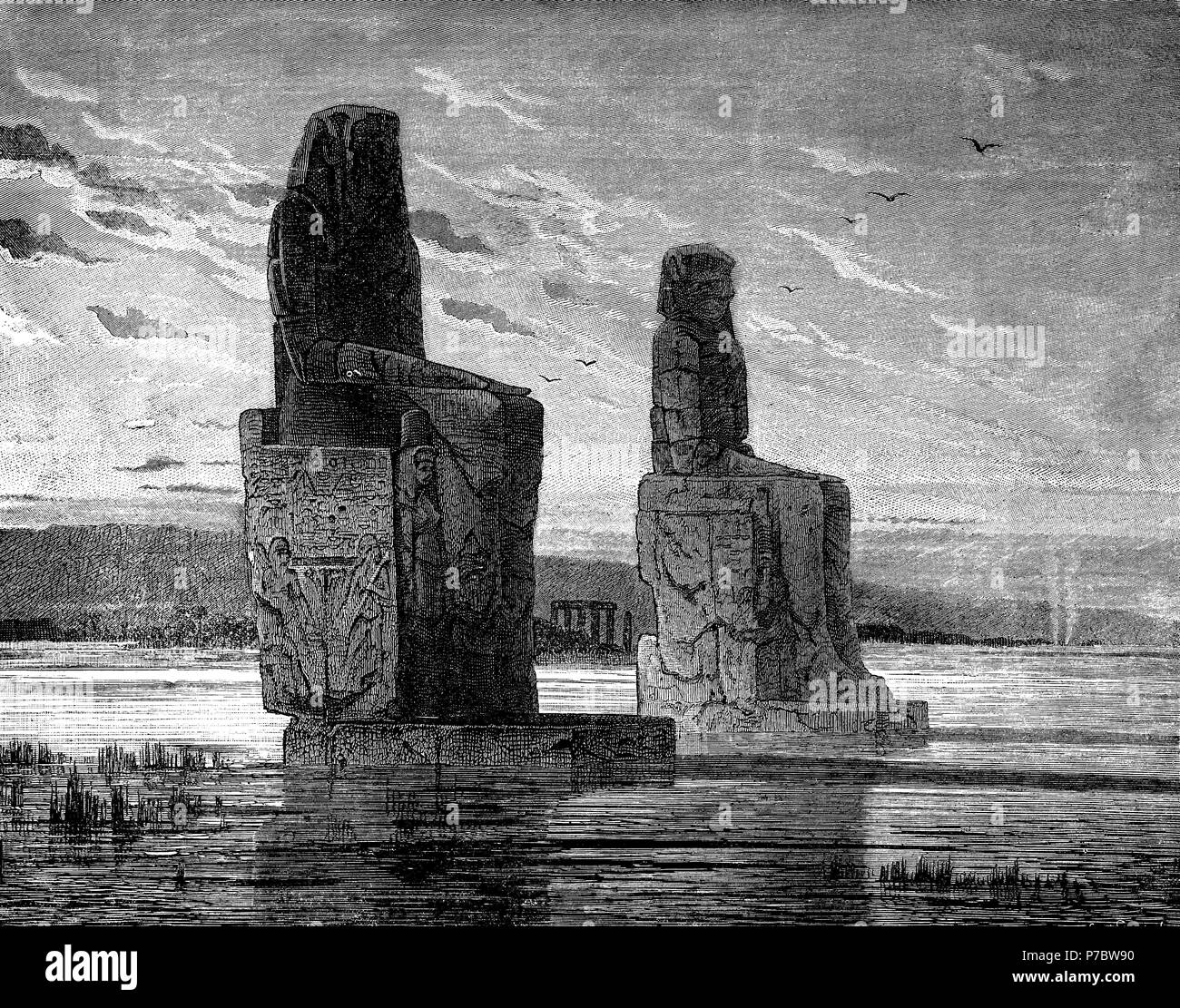 Egipto. Los colosos de Memnon durante una inundación del río Nilo. Grabado de 1880. Stock Photo