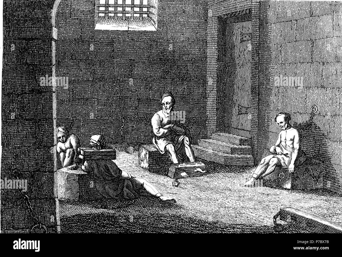Historia sagrada. Presos encarcelados con grilletes. Grabado de 1862. Stock Photo