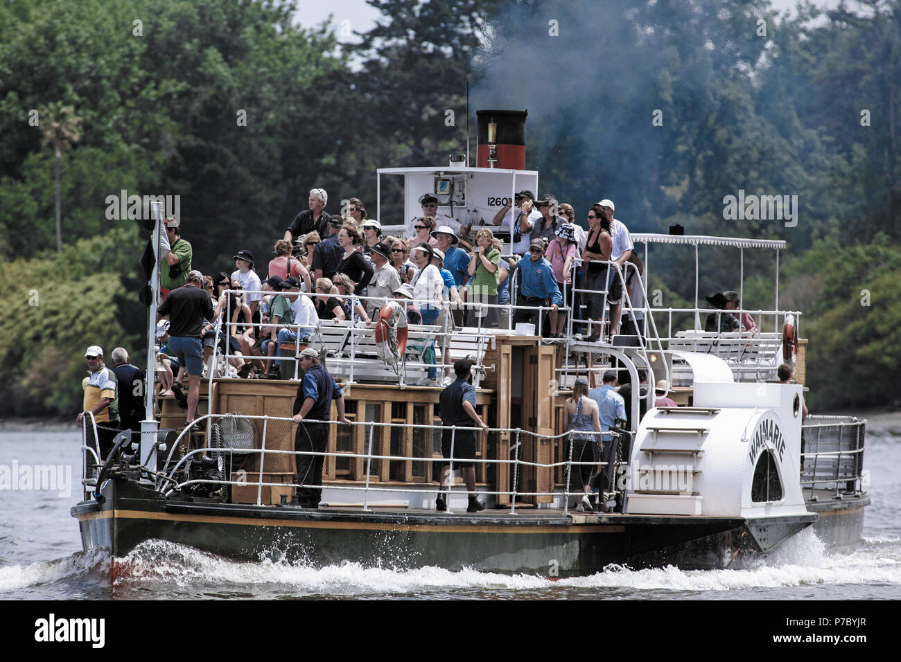 Passengers aboard the Waimarie paddle steamer on the Whanganui river, New Zealand Stock Photo