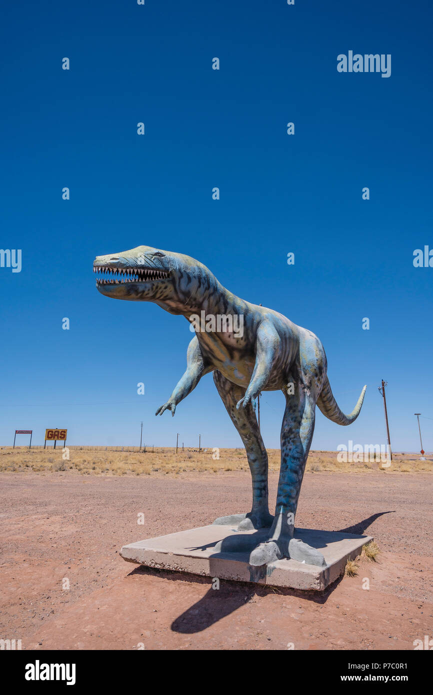 A huge dinosaur sculpture serves as a roadside attraction at the Hopi