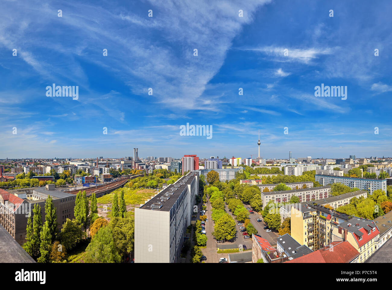 Eastern Berlin from above: panoramic view over modern buildings, television tower on Alexanderplatz and city skyline in Summer Stock Photo