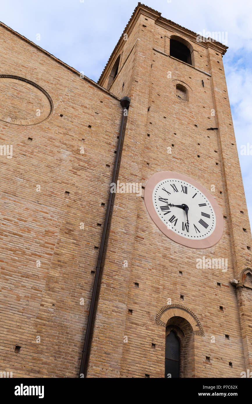 Old clock tower. San Agostino cathedral of Fermo, Italy Stock Photo