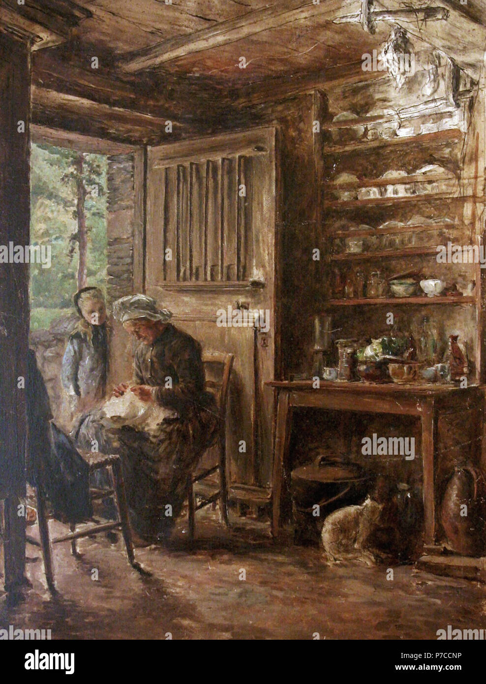 Monzies Louis Femme Cousant A La Porte De Sa Maison Stock Photo