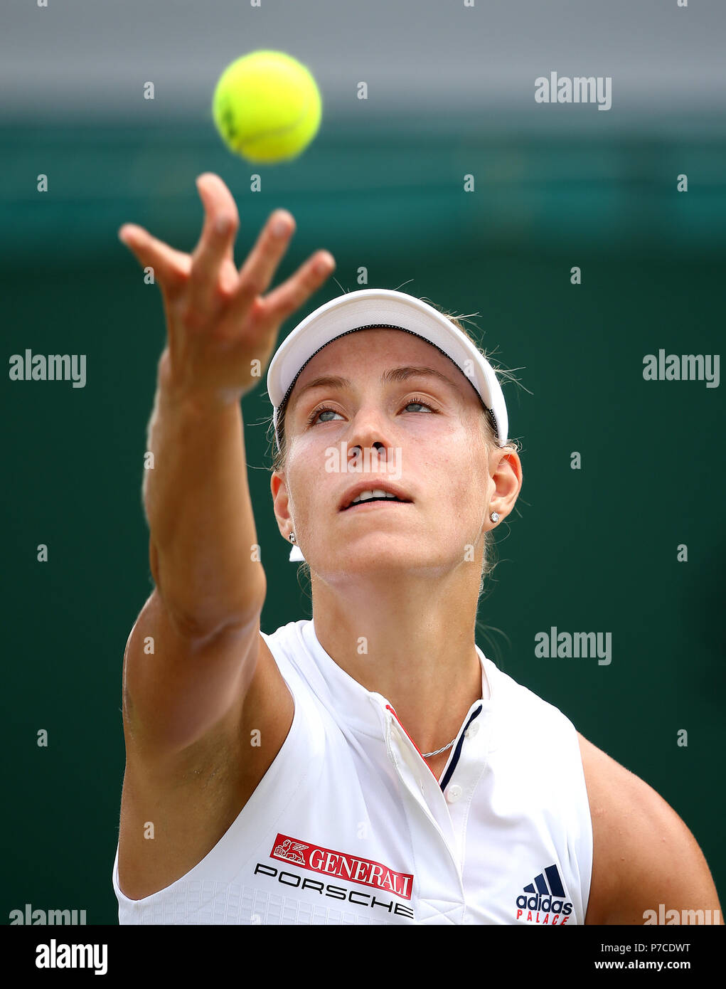 Angelique Kerber serves on day four of the Wimbledon Championships at the All England Lawn Tennis and Croquet Club, Wimbledon. Stock Photo