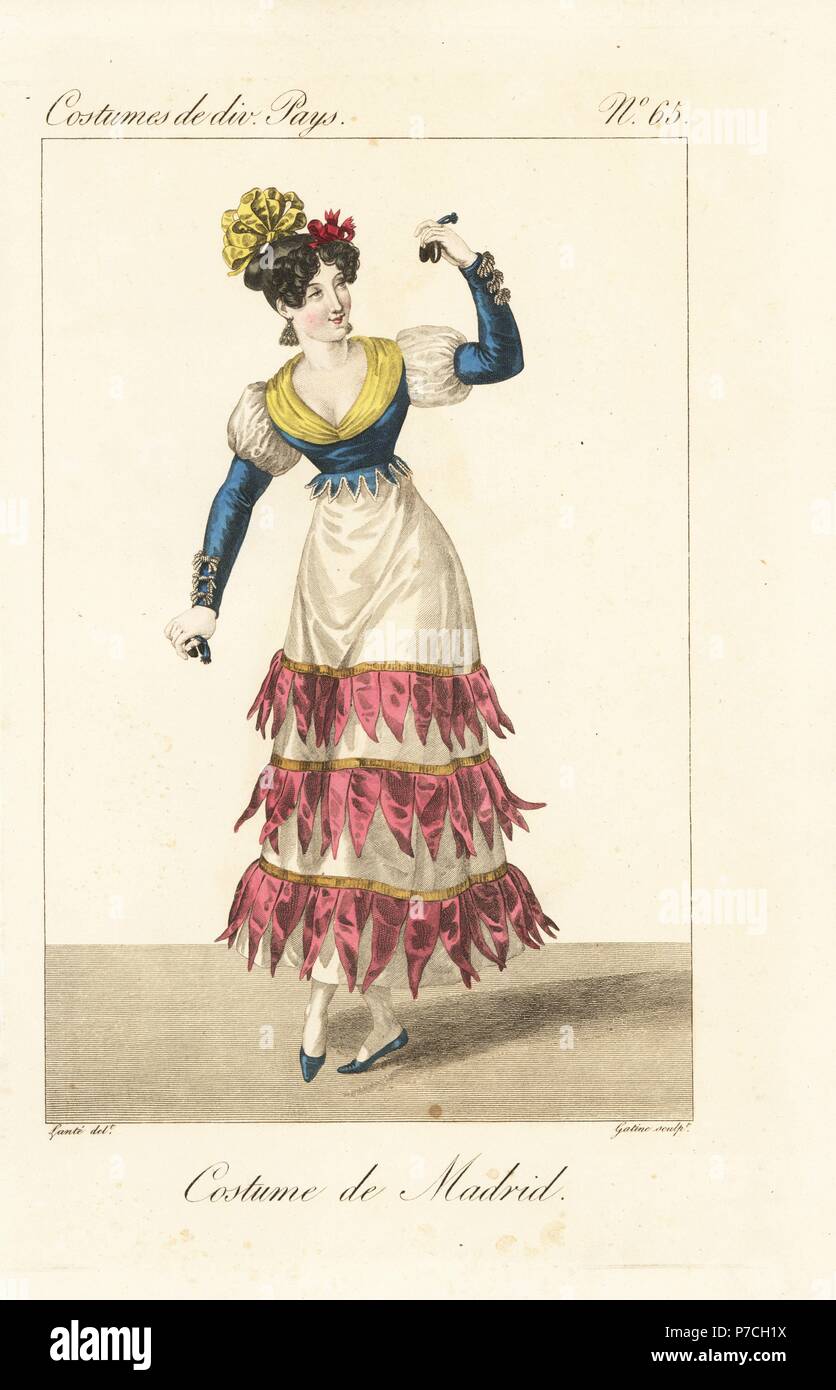 Dancer of Madrid, Spain, 19th century. In a dress for the fandango or bolero with short petticoat, tight corset, and hair tied up in ribbons. Handcoloured copperplate engraving by Georges Jacques Gatine after an illustration by Louis Marie Lante from Costumes of Various Countries, Costumes de Divers Pays, Paris, 1827. Stock Photo