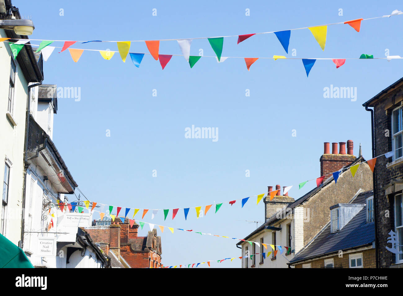 Colourful bunting flags over a street in Bury St Edmunds, UK Stock Photo Alamy