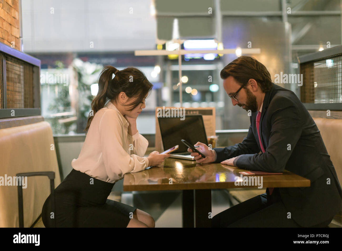 Beautiful business woman waiting airport hi-res stock photography and ...