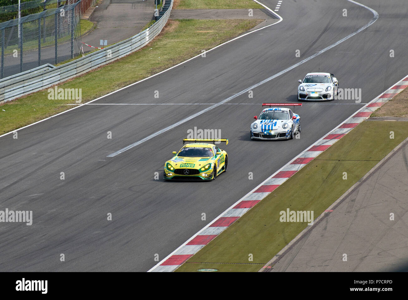 Mercedes-AMG GT3 followed by Porsche 911 GT3, Nuerburgring 24h race 2017, long distance race, Eifel, Rhineland-Palatinate, Germany, Europe Stock Photo