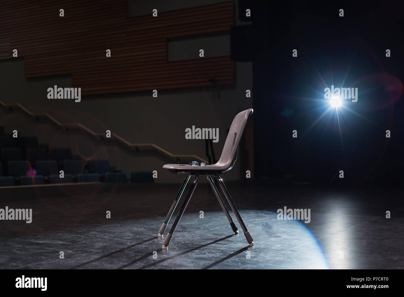 Chair on stage at theatre Stock Photo - Alamy