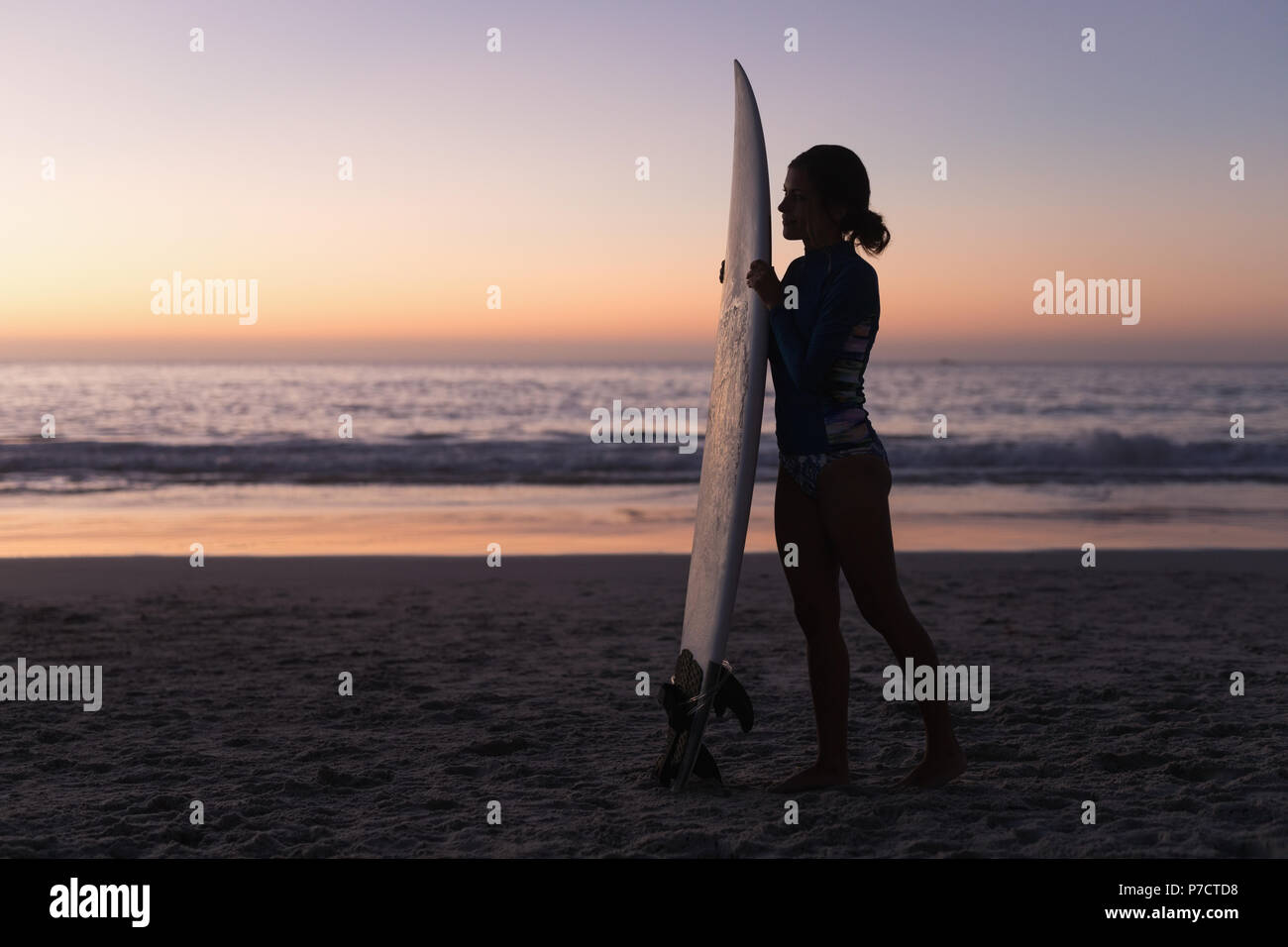 Woman in silhouette holding hi-res stock photography and images - Alamy