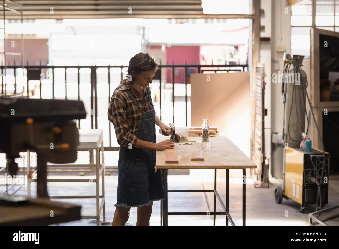 Female entrepreneur working checking hi res stock photography and