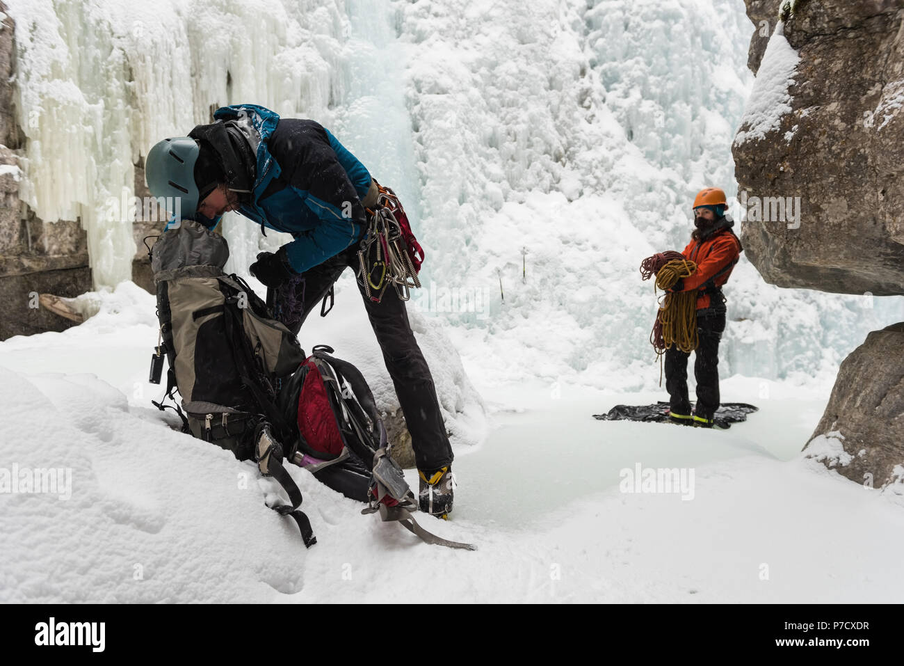 Male rock climber checking his backpack Stock Photo Alamy