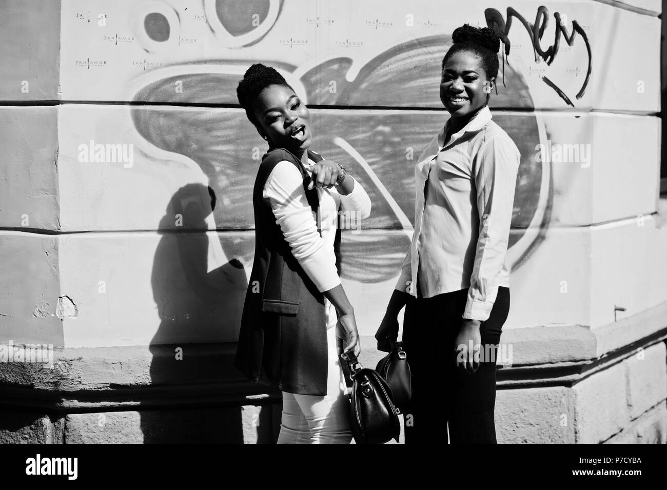 Two girls girlfriends friends Black and White Stock Photos & Images - Alamy