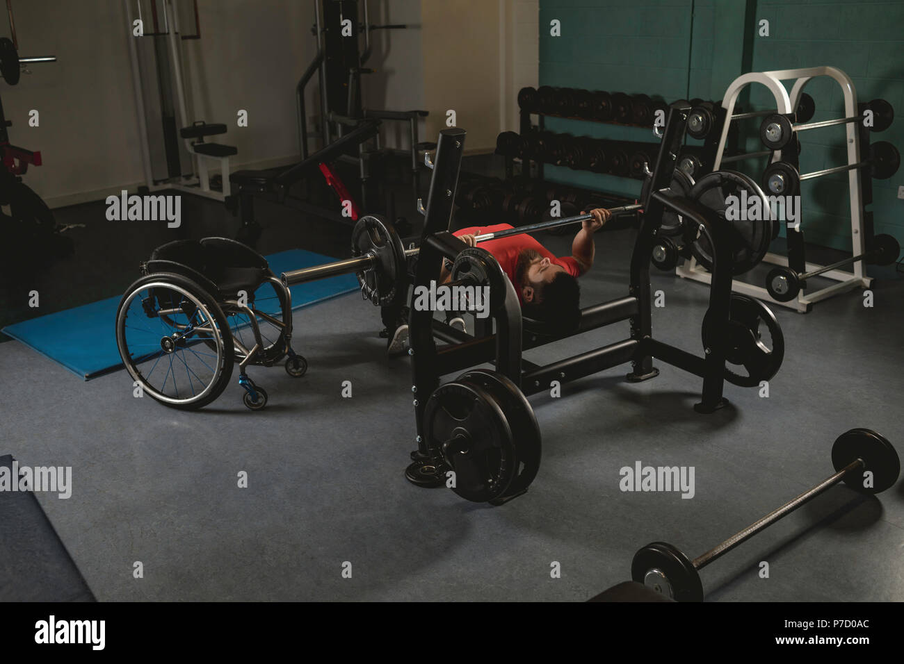 Handicapped Man Doing Chest Workout On Bench Press With Barbell