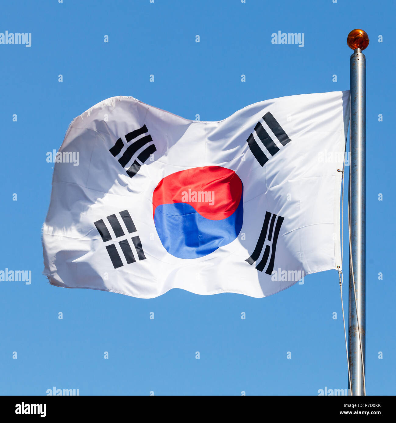 Flag of South Korea, also known as the Taegukgi waving on a flagpole Stock Photo