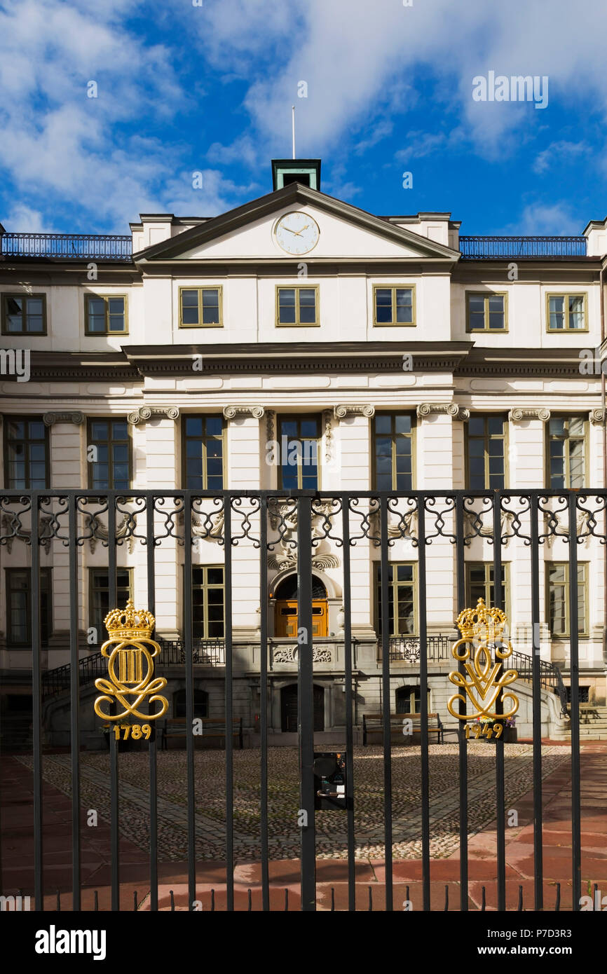 Swedish Supreme Court building with ornate black wrought iron gate with  golden crown details, Stockholm, Sweden Stock Photo - Alamy
