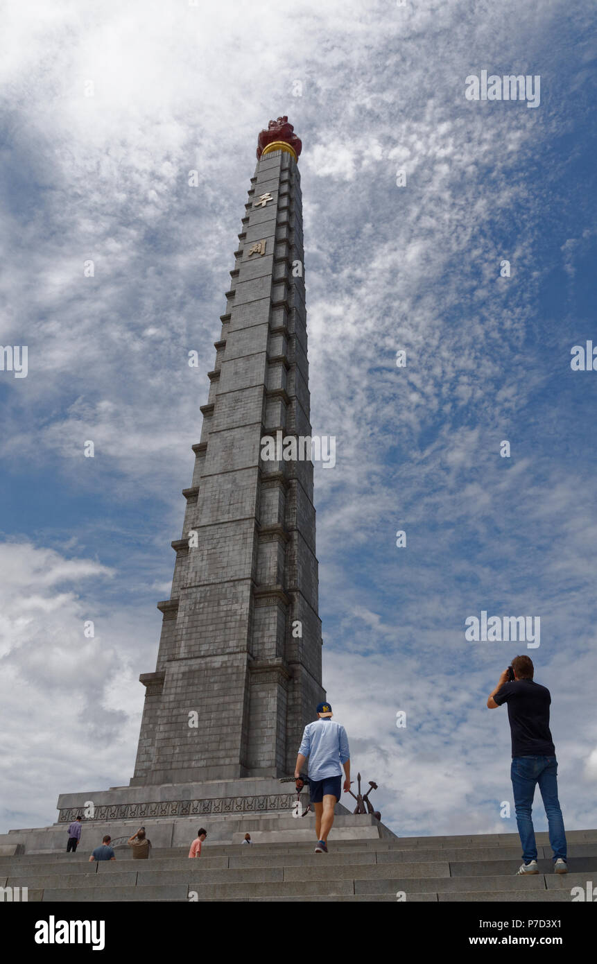 The Juche Tower in Pyongyang, North Korea against a deep blue sky Stock Photo
