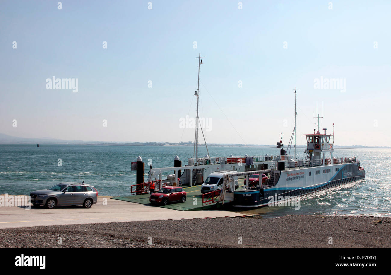 Cars arriving at Greenore in Ireland from Greencastle in Northern Ireland on the Carlingford Ferry Stock Photo