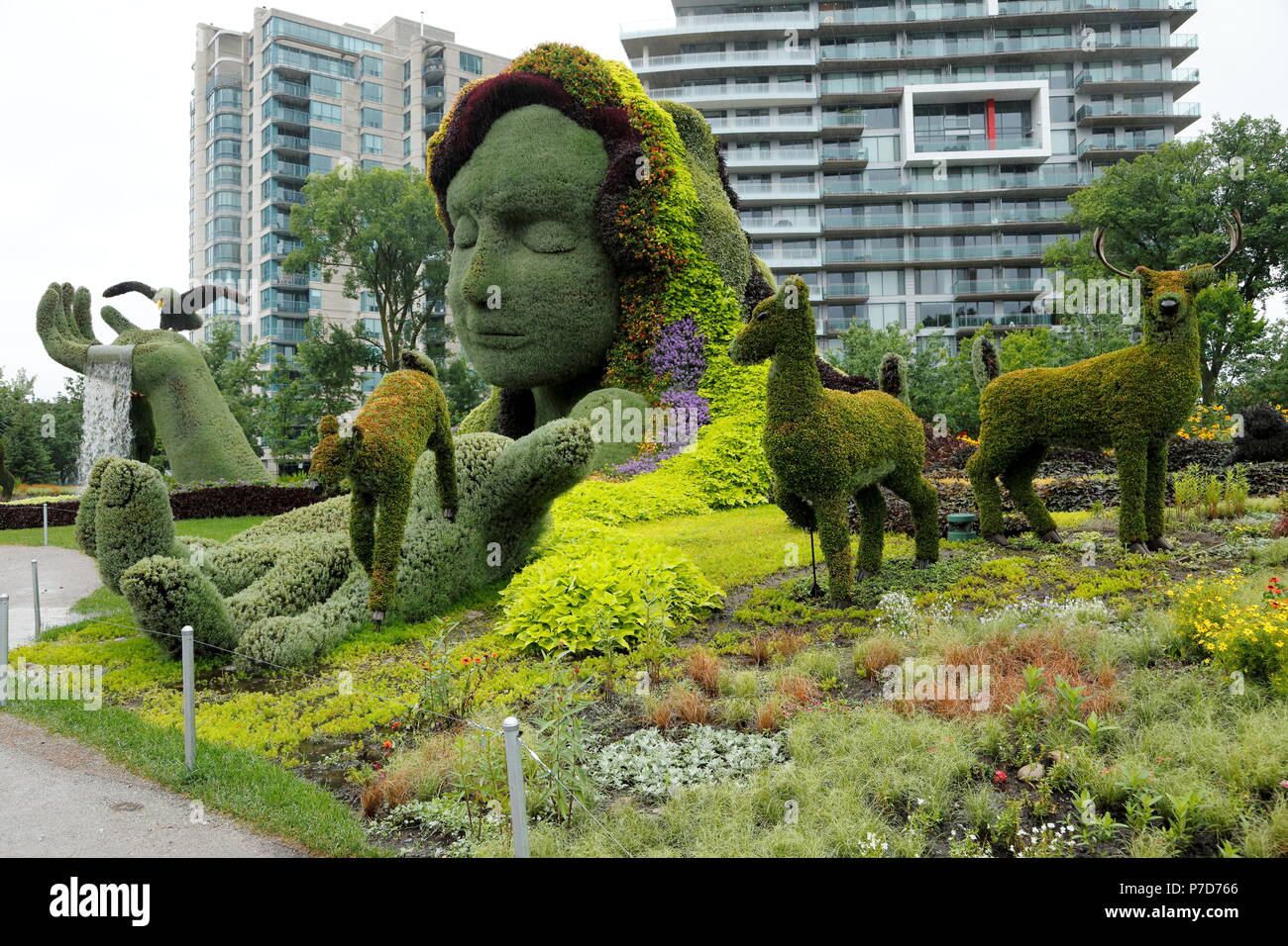 Plant sculpture Mother Earth with buildings behind, Gatineau, Quebec Province, Canada Stock Photo - Alamy
