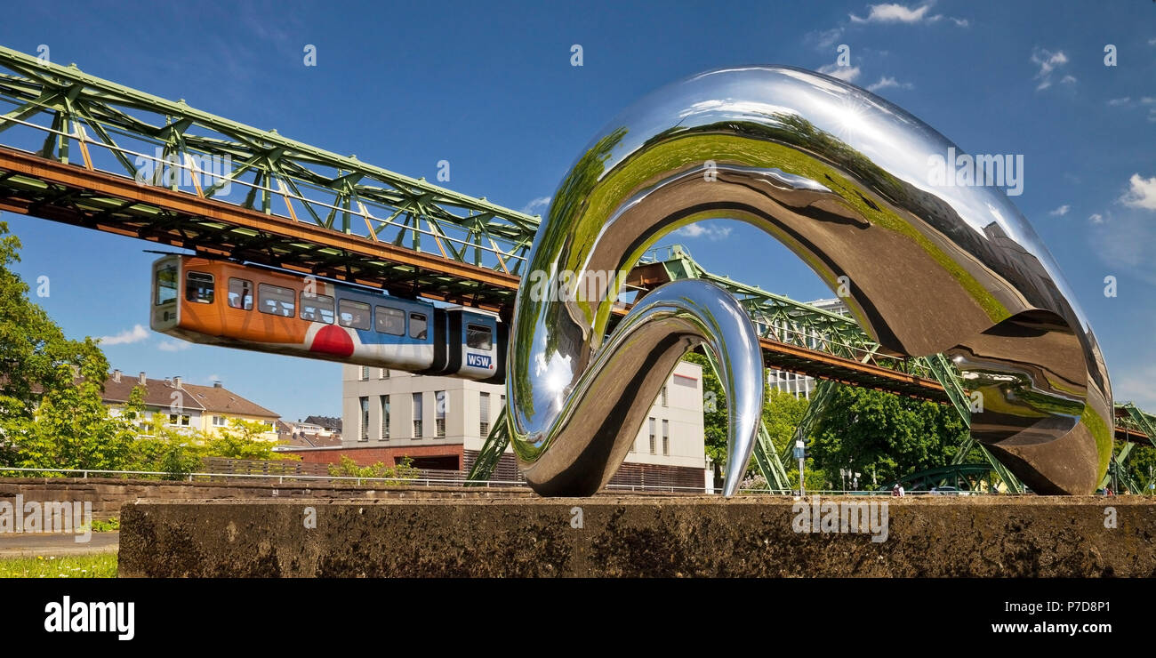Suspension railway and work of art I'm alive made of polished stainless steel, artist Tony Cragg, Barmen, Wuppertal Stock Photo